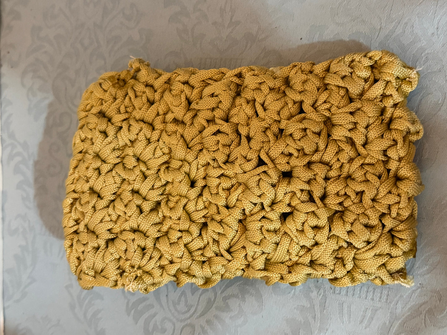 Crochet yellow pouch