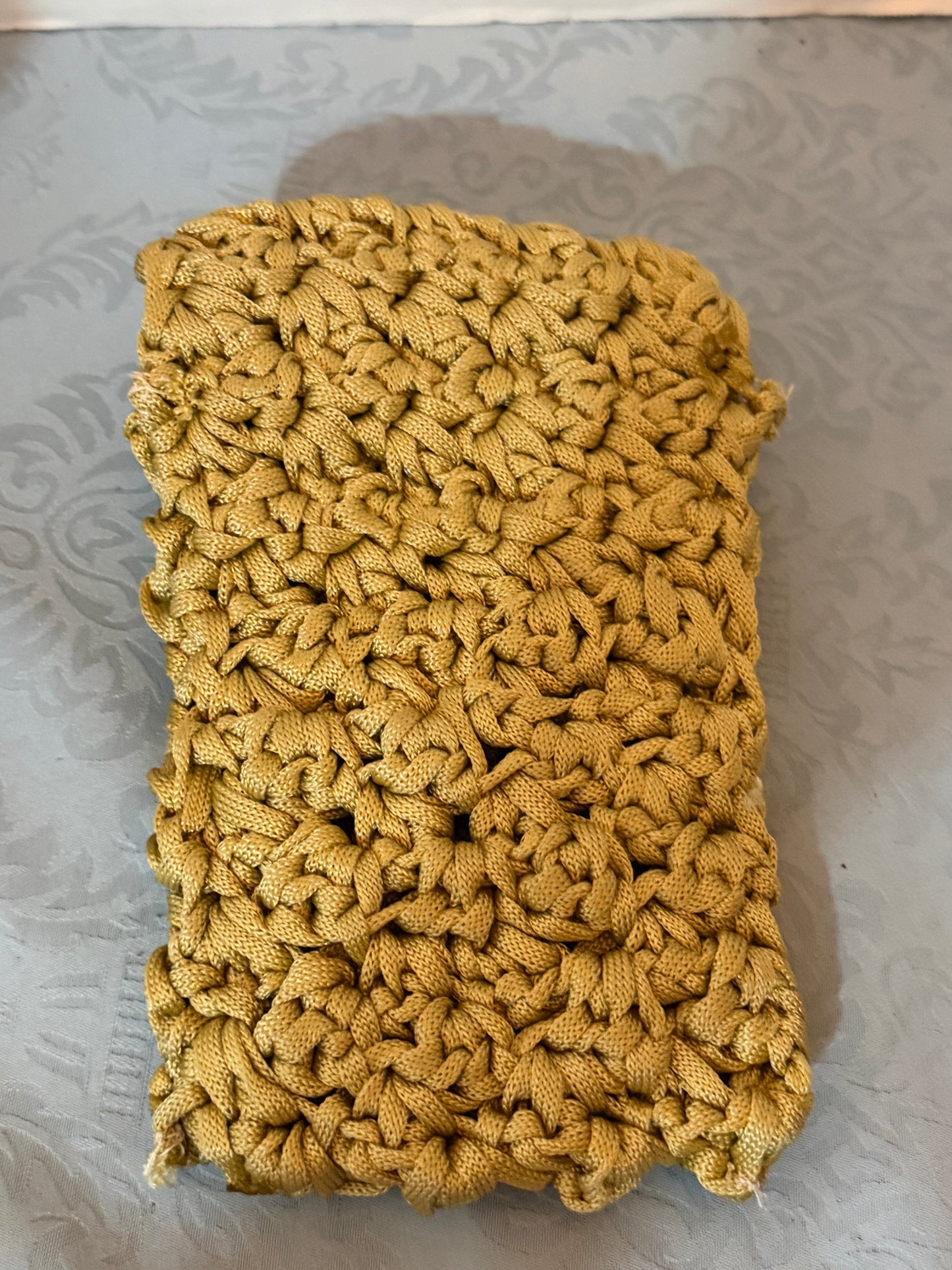 Crochet yellow pouch